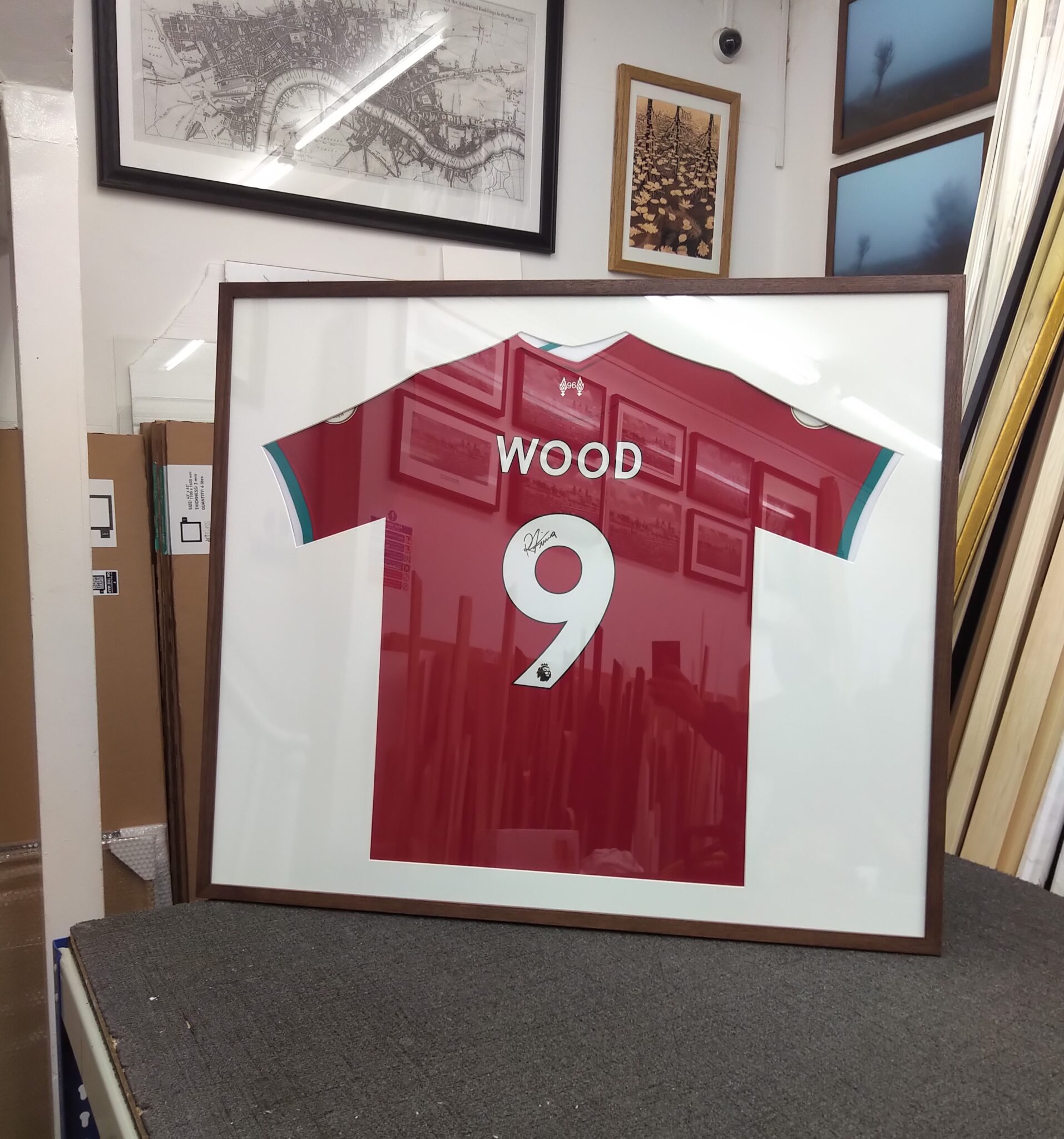 A football shirt in a frame