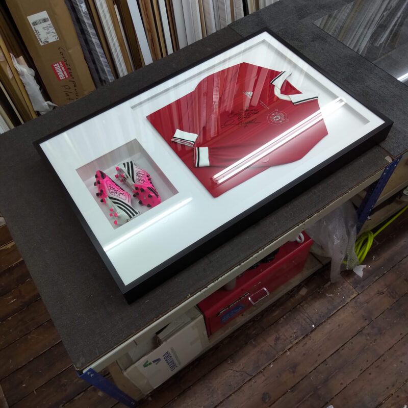 Custom made football shirt and boots frame