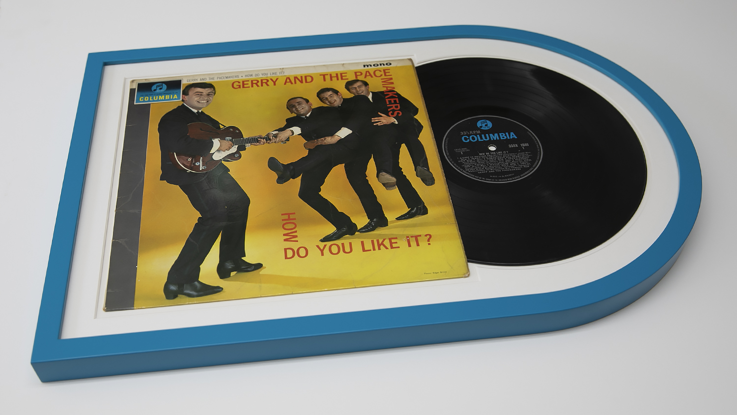 A Vinyl Record Framing of Gerry and the Pacemakers' "How Do You Like It?" on display.