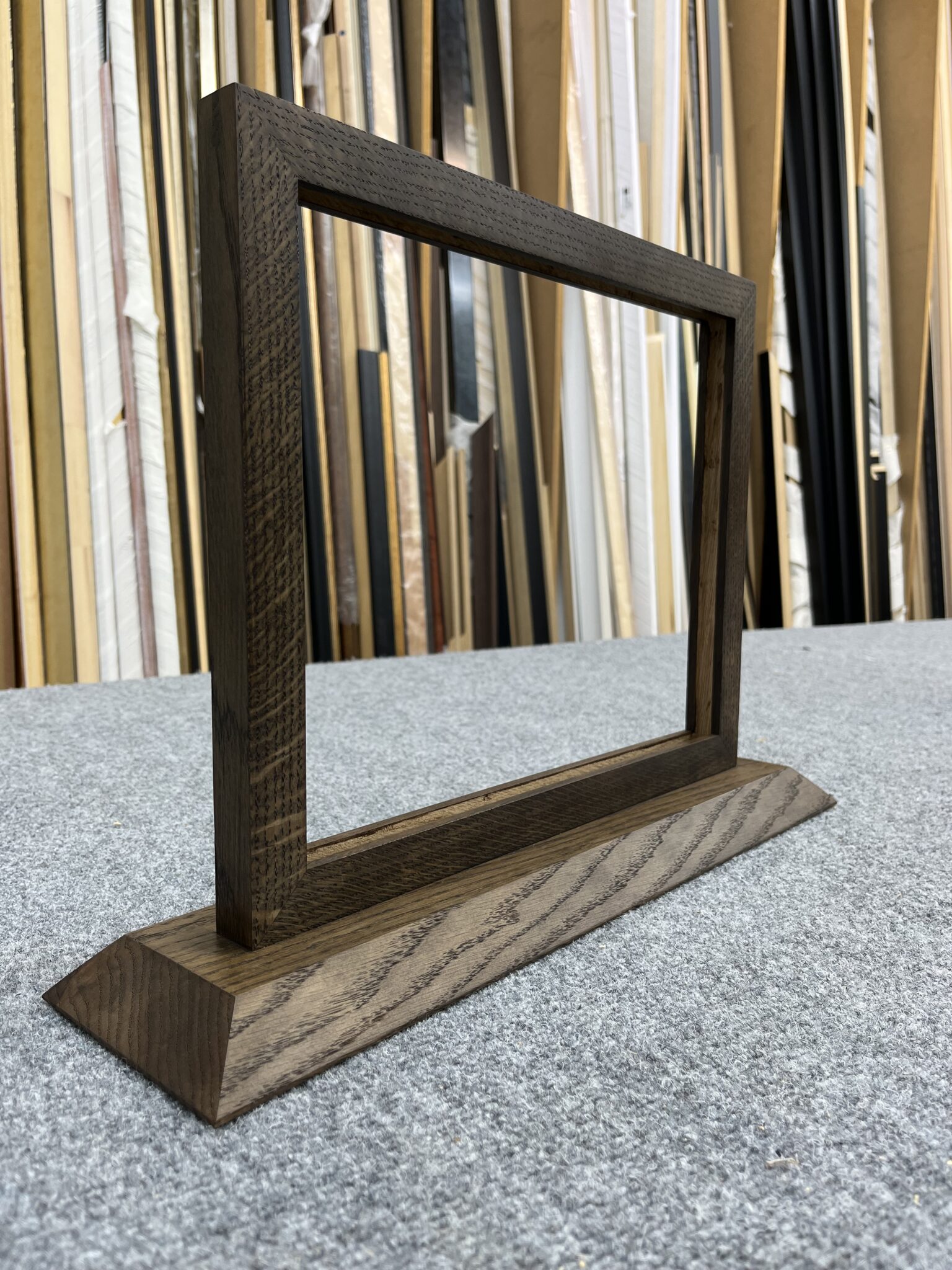 EMPTY DOUBLE-SIDED FRAME WITH PLINTH STAND
