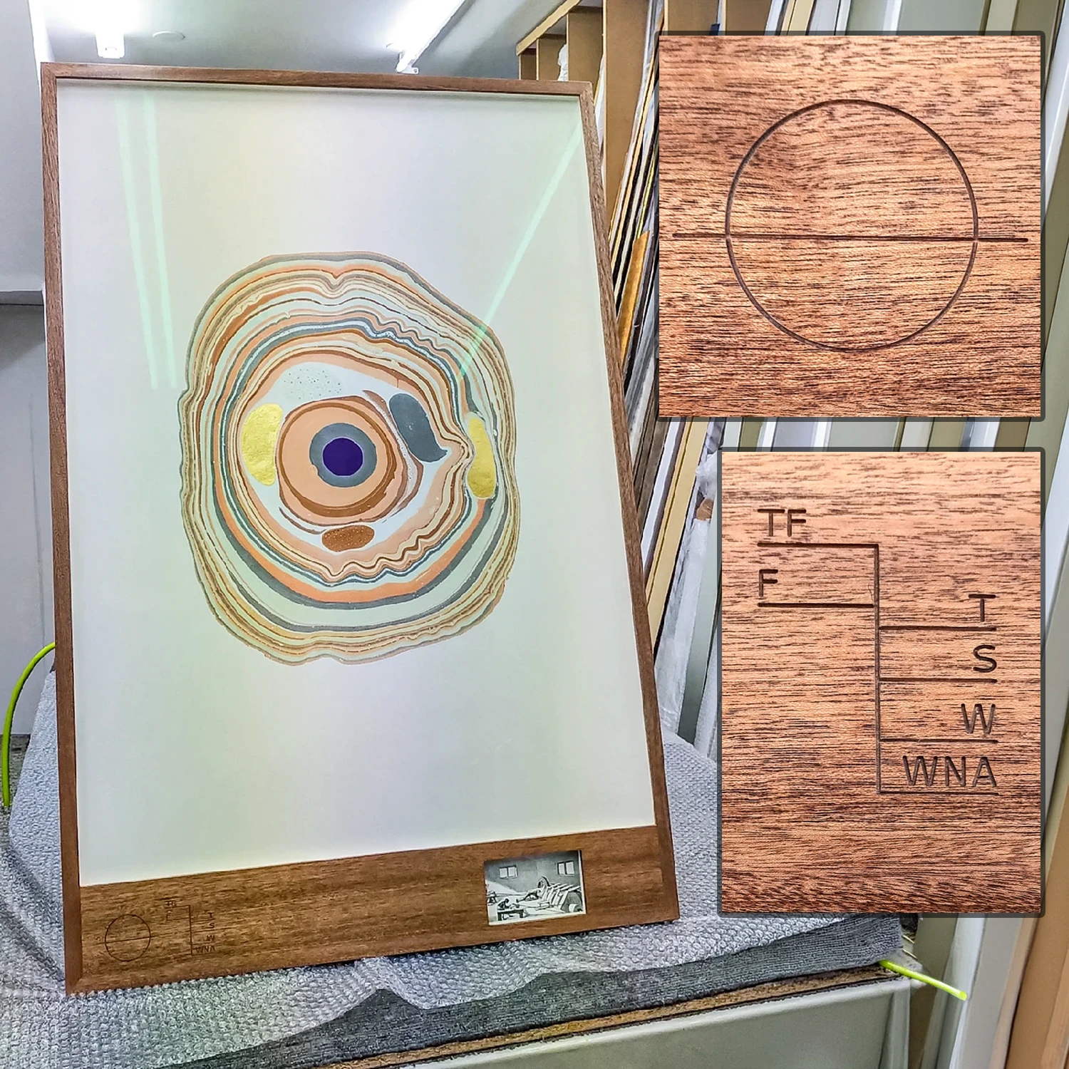 Sapelie picture frame with two apertures and carved design on the lower panel