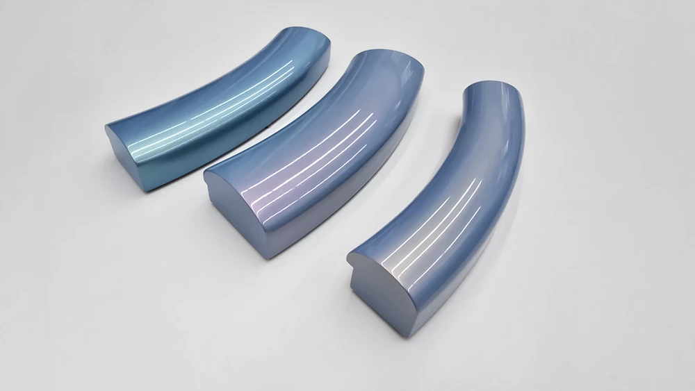 three curved picture frame sections on two-tone mirror gloss blue