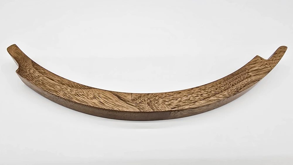 curved cherry wood round mirror frame section on white background