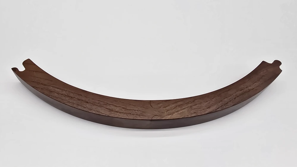 curved walnut round mirror frame section on white background
