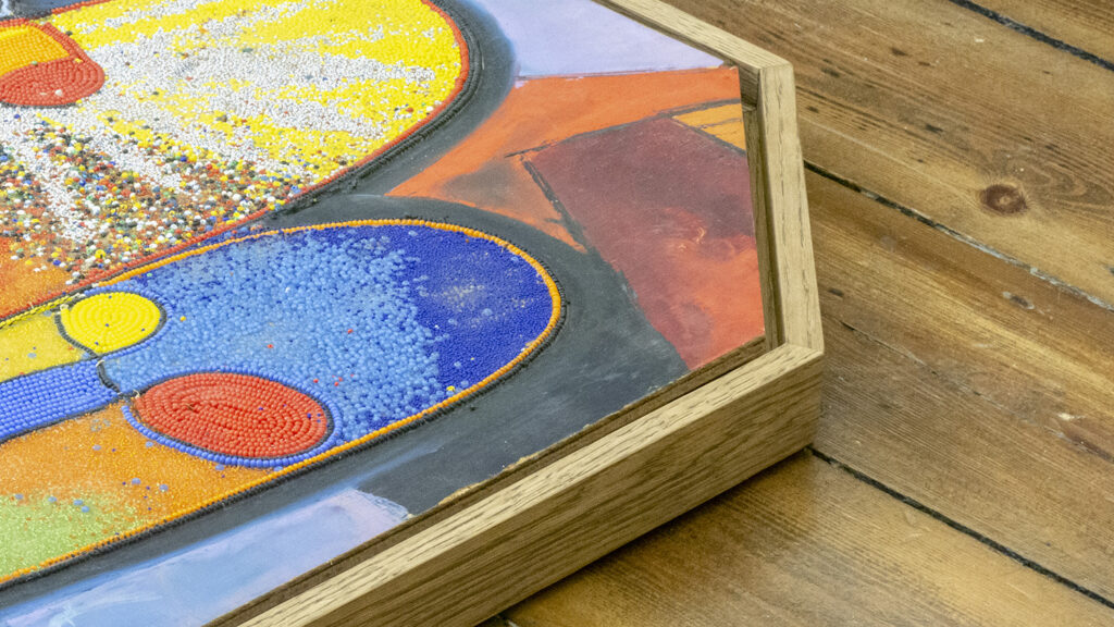 What is the difference between a floater frame and a traditional frame?